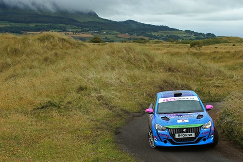 Kslum Griffinm rounds a bend on a scenic race route as part of the ni rally.