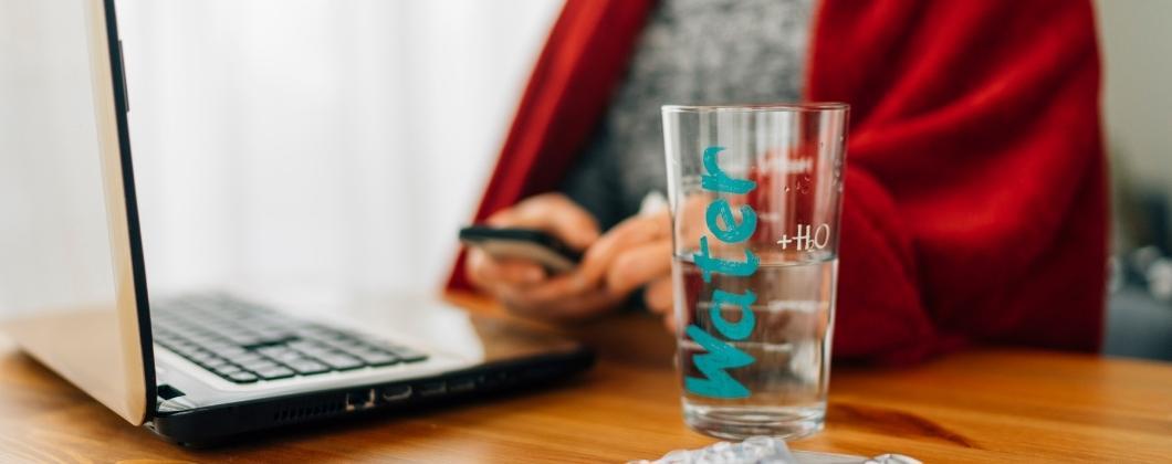 Insurance expert working with plenty of water