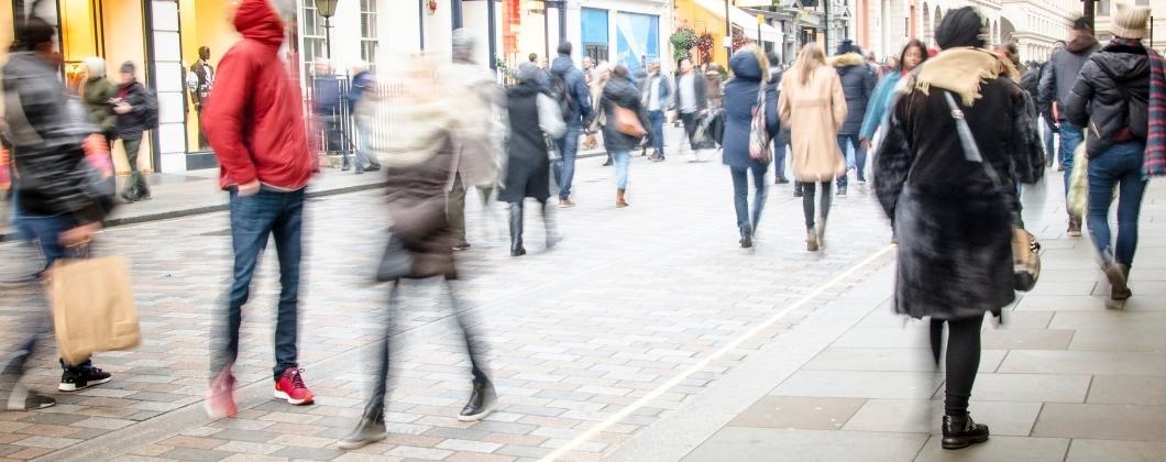 Business owners walking the highstreet looking for commercial property